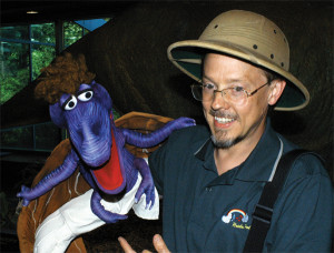 David Messick with Dino Puppet